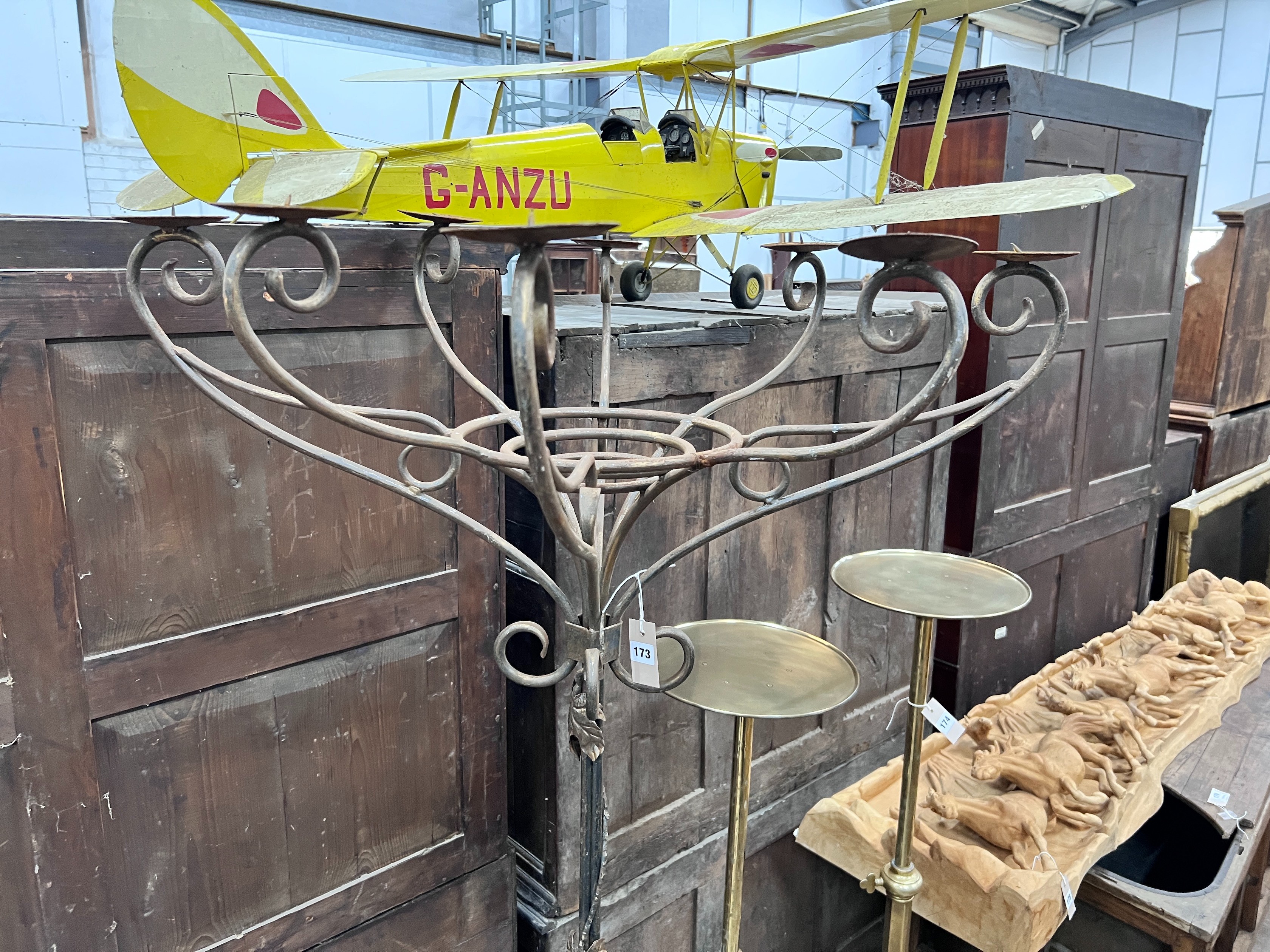 A wrought iron candelabrum lamp standard, height 187cm *Please note the sale commences at 9am.